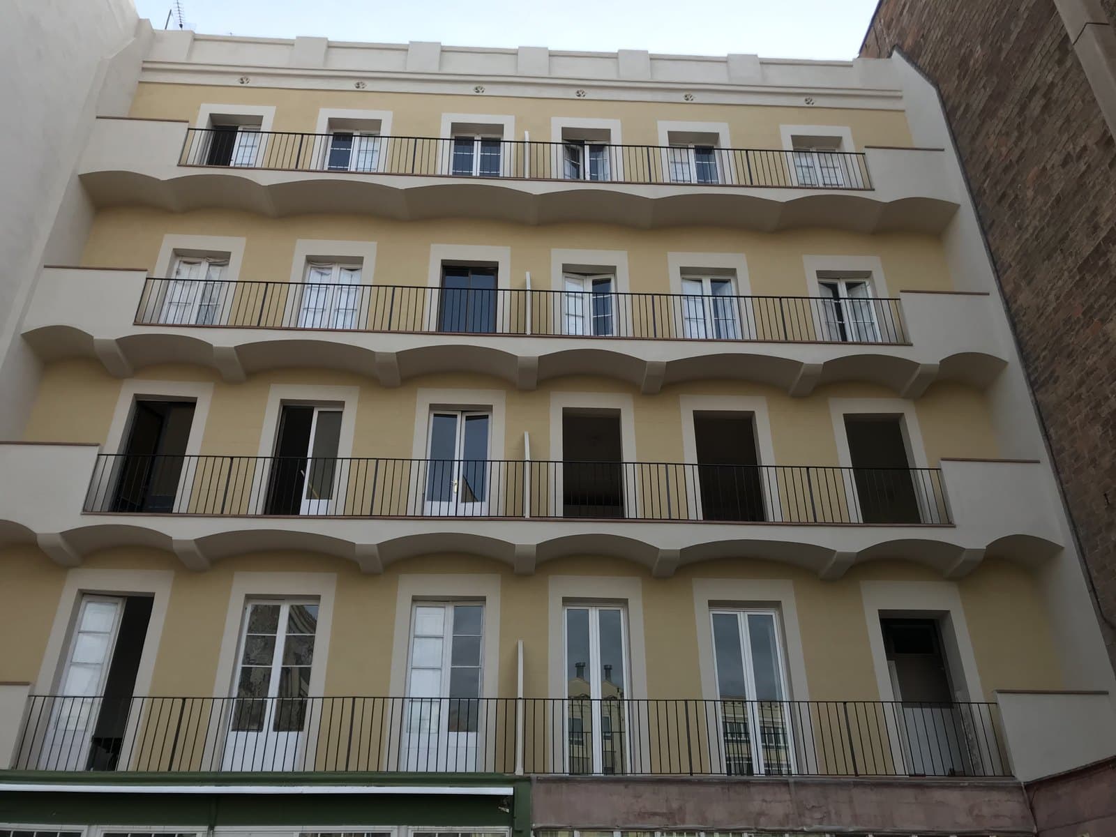 Rehabilitación de fachada de comunidad en el Eixample de Barcelona realizada por CYR89